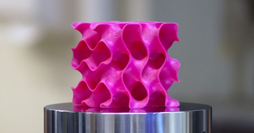 3-D-printed gyroid models such as this one were used to test the strength and mechanical properties of a new lightweight material. Credits: Melanie Gonick/MIT